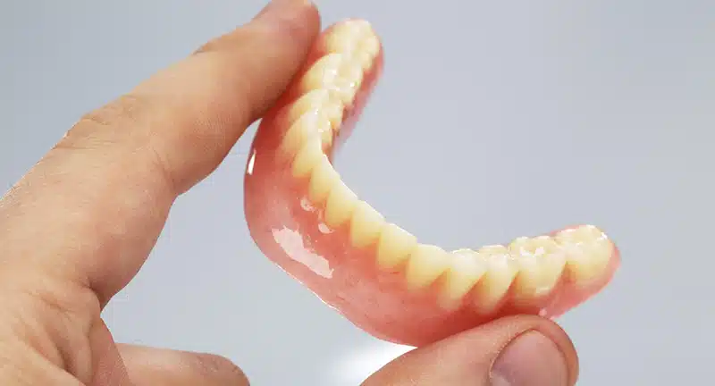 Perdida de hueso por prótesis dental